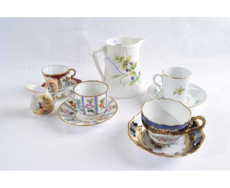 A Royal Worcester large jug with painted view of a bird in the manner of James Powell together with a quantity of miniature c