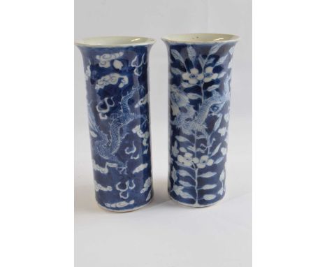 Pair of 19th century Chinese porcelain vases the blue ground decorated with dragons on Kangxi style with four character mark 