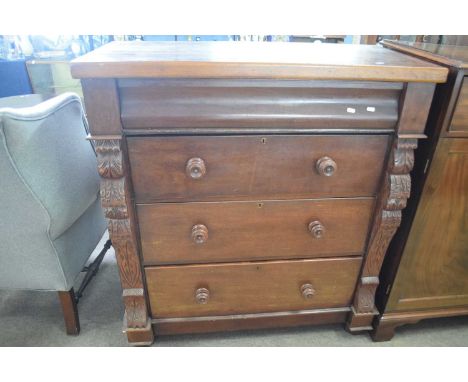 Victorian mahogany veneered Scotch style four drawer chest with carved pillar decoration and turned knop handles, 108cm wide