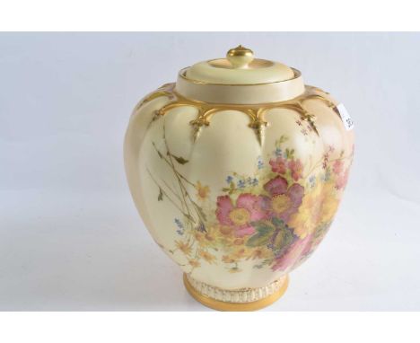 A Royal Worcester blush ground vase and cover of globular form painted with flowers