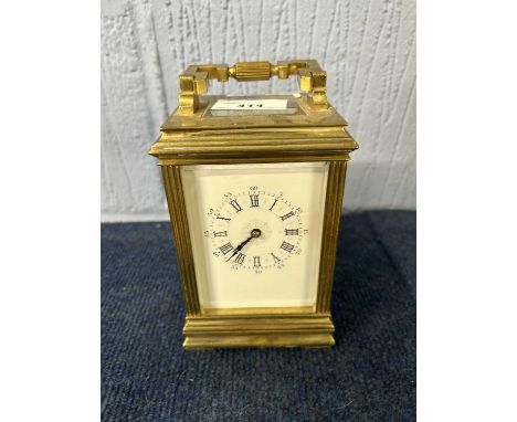 A 20th Century carriage clock with key
