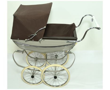 Silver Cross vintage doll's pram, finished in beige and brown, Good, 36"/92cm tall.