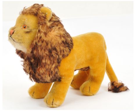 Steiff Leo vintage lion, yellow tag 1328,00, 1964-1967, with button, missing cloth and card tags, amber and black plastic eye