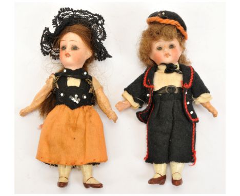 F &amp; W Goebel pair of antique miniature bisque girl and boy dolls, German, c 1910, impressed 20/0, fixed blue glass eyes, 