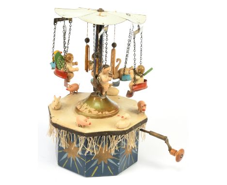 Erzgebirge wooden and tinplate musical antique merry-go-round, German, pre-war, with six wooden figures, seated within tinpla