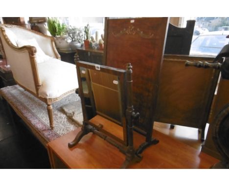 A FIRE SCREEN AND A TOILET SWING MIRROR