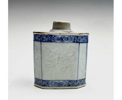 A Chinese export porcelain blue and white tea caddy, of angled rectangular section and incised decoration, height 10cm.