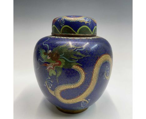 A Chinese cloisonne ginger jar and cover, circa 1900, the blue ground decorated with stylised dragons chasing the flaming pea