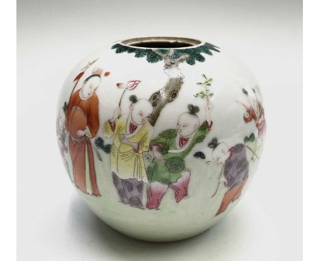 A Chinese famille rose porcelain candy jar, 18th/19th century, decorated with children playing in a garden scene, height 12.5