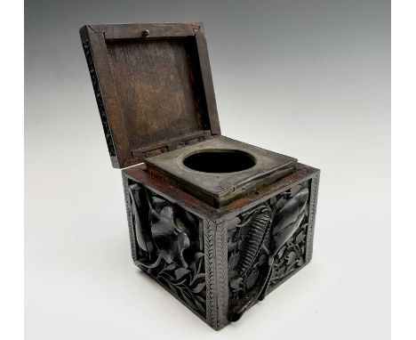 A Kashmir hardwood tea caddy, 19th Century, carved in high relief with flowers, foliage and seed heads, with metal liner, hei