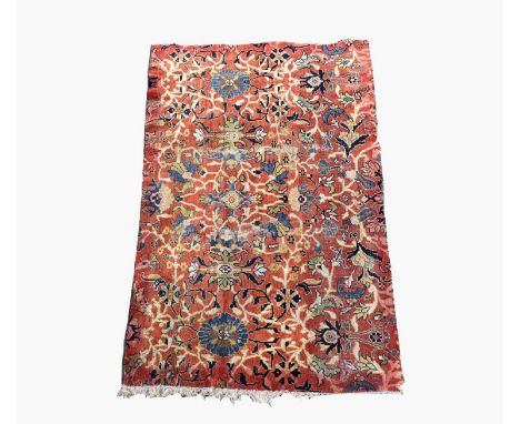 A Mahal carpet fragment, West Persia, circa 1900, the madder field with an all over design of flowering vines, leaves and pal