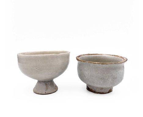 A Chinese stem cup, labelled 'Stem cup, Northern Song Dynasty, Ying Qing, 960.1127', height 5.5cm, diameter 6.7cm and a simil