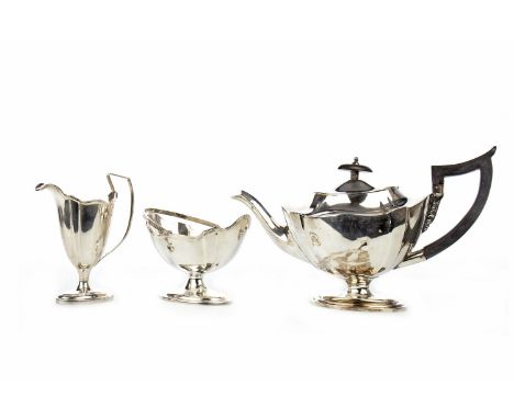 EDWARDIAN SILVER THREE PIECE TEA SERVICE, maker Thomas Bradbury &amp; Sons Ltd, London 1908, comprising teapot, sugar and cre