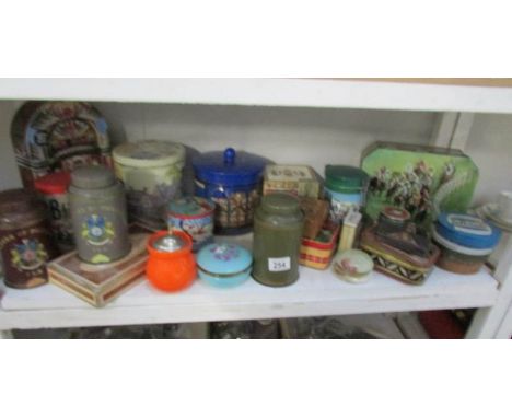 A shelf of old tins