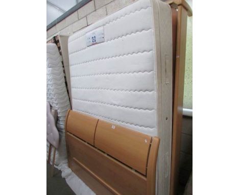 A 4'6" Sealy divan bed, in good condition