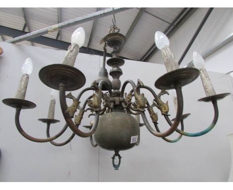 A large 8 lamp brass ceiling light