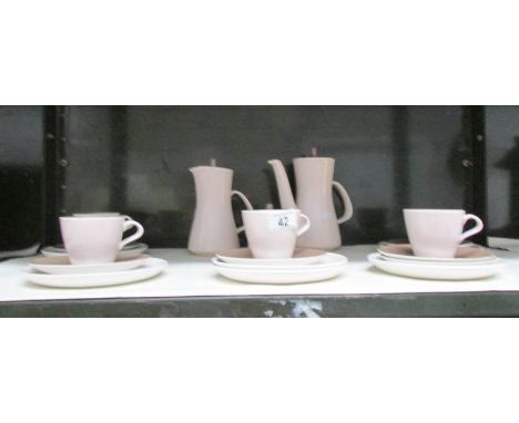 21 pieces of Poole pottery including coffee pots
