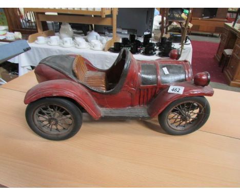 A large scale model of a vintage car