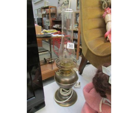 An electrified brass oil lamp, a/f