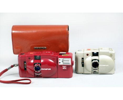 Uncommon Coloured Olympus XA2 Compact Cameras. Grey XA2 (well used) and a red XA2 with matching A11 flash, with a red case. {