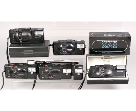Full Set of Olympus XA Compact Cameras. Comprising XA (with CRF) & A16 Flash in presentation case, XA1 & A11 Flash, XA2 & A16