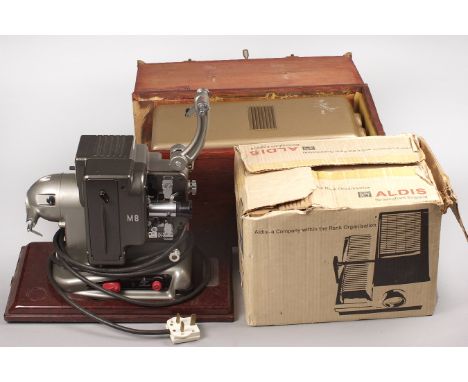 A Hawk Mk5 Stereo Projector. (condition 5F) also a Bolex M8 cine projector and a Rank Aldis 35mm slide-projector.