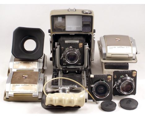 Extensive Linhof Technica 70 3-Lens Medium Format Outfit. Comprising camera body, plastic parts stained through use (conditio