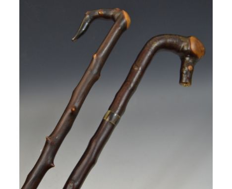 A horn and blackthorn market stick, rose capped finial; another (2)