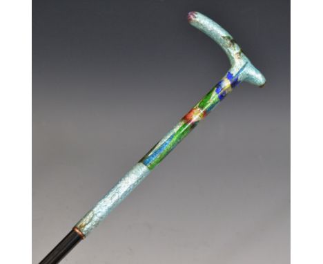 A Japanese cloisonne walking stick, the haft with irises and foliage, ebonised shaft, 86cm long, Meiji period