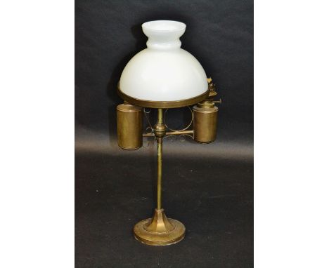 A oil lamp, with white glass shade, the column with two burners, 69cm high