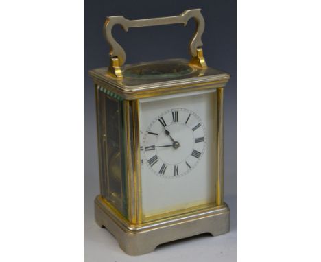 A 20th century carriage clock, Roman numerals, bevelled glass panels, swing handle, 13.5cm high