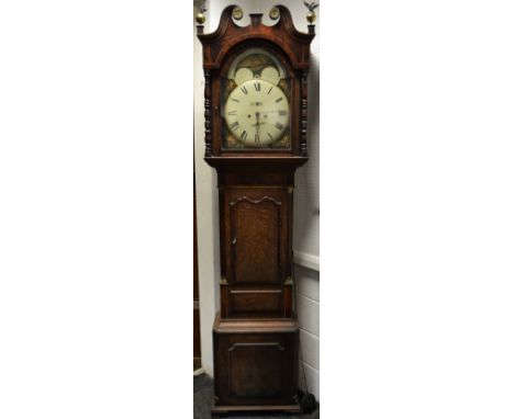 A 19th century mahogany longcase clock, the 35cm painted arched dial with Roman numerals, subsidiary seconds dials, twin wind