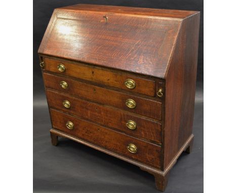 A George III oak bureau, with fall front, the interior with drawers and pigeon holes, four long drawers, bracket feet, 105cm 