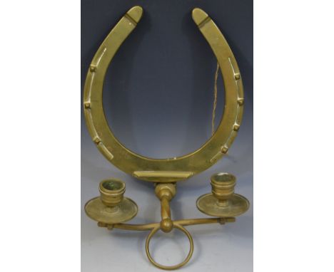 Equestrian Interest  - a brass two-light wall sconce, as a horseshoe, the arms as a bit,  26cm high