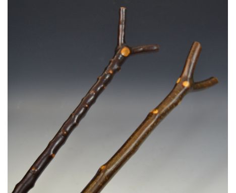 A blackthorne thumb stick, 115cm long; another, 129cm long (2)