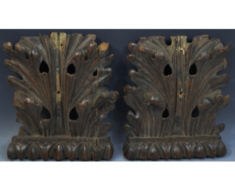 A pair of 17th century oak architectural fragments, each carved with crisp acanthus, 31cm x 25cm, c.1660