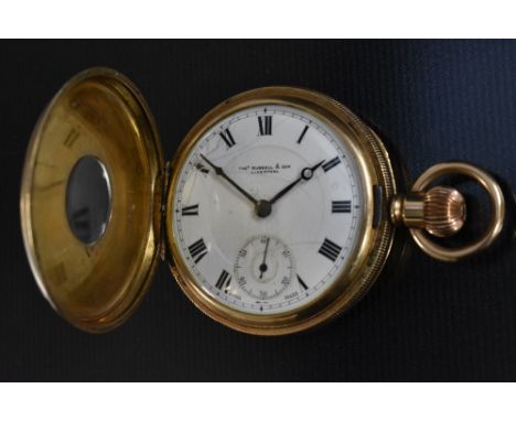 A Thomas Russell gold plated half hunter pocket watch, white dial, Bold Roman numerals. minute track, subsidiary seconds, but