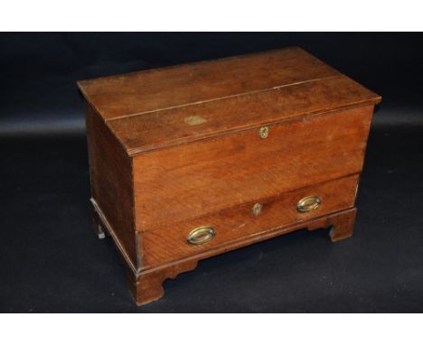 A 19th century oak mule chest, hinged cover, long drawer, bracket feet. 58cm high x 86cm wide x 48cm deep.