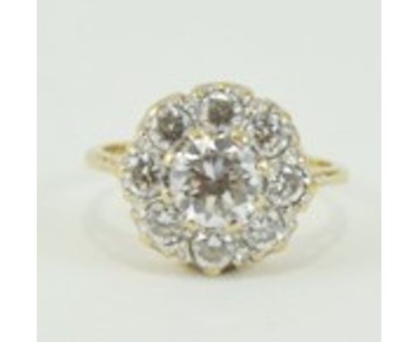 A 9ct gold white gemstone  daisy ring size J