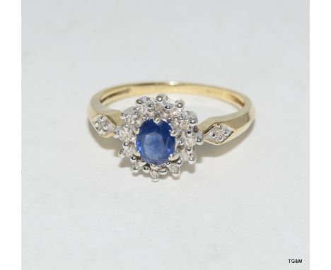 9ct gold diamond & sapphire cluster ring. Size J