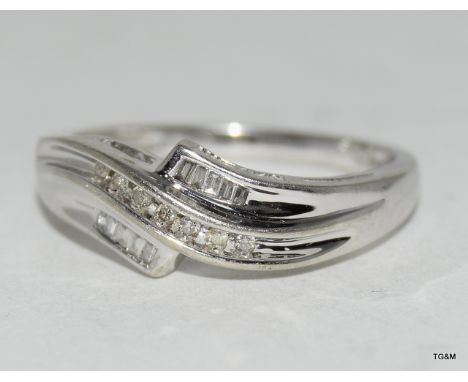 9ct white gold diamond ring. Size M