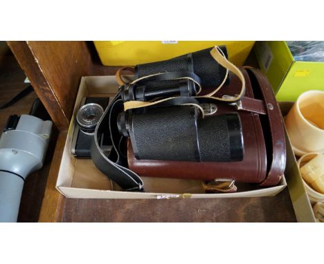 A pair of Carl Zeiss Jenoptem 10x50w binoculars, cased; together with an Olympus Trip 35 camera.   Condition Report:  Serial 