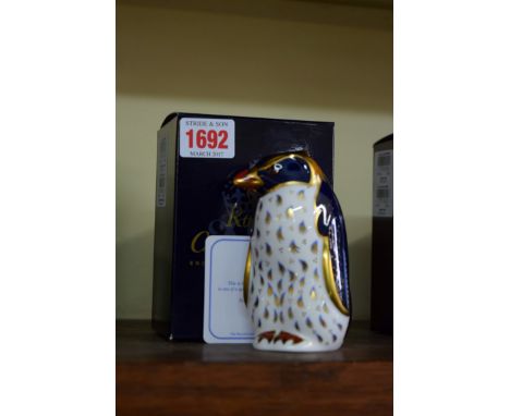 A Royal Crown Derby Imari Rock Hopper Penguin, with stopper, boxed and with certification.  