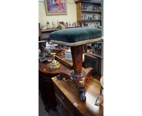 A Victorian figured walnut adjustable piano stool, on tripod base.