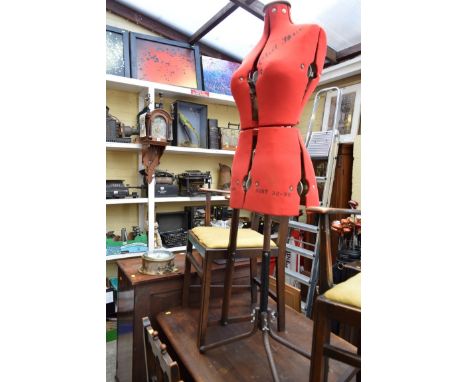A vintage Chil-Daw adjustable dressmaker's dummy, on tripod stand. 