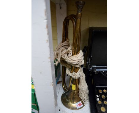 A brass bugle. 