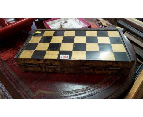 An early 19th century Anglo-Chinese lacquer ware folding backgammon and chequer board, 42.5cm wide; together with various pla