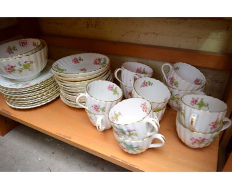 A late 19th century Coalport 'Redcurrant' pattern part tea service. 