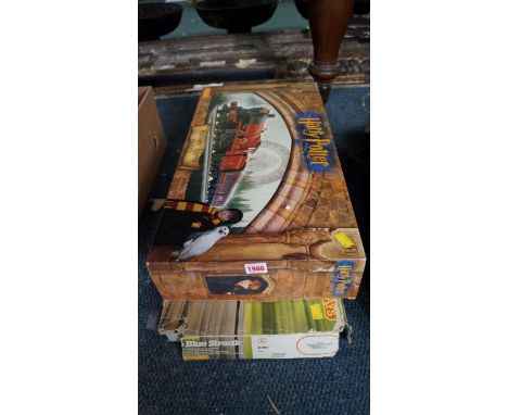 A Hornby Harry Potter Hogwarts Express electric train set, boxed; together with a Hornby 'The Blue Streak' electric train set