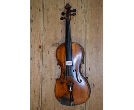 An antique Continental violin, labelled 'Copy of Antonius Stradivarius', with 14 inch back, in hard case.